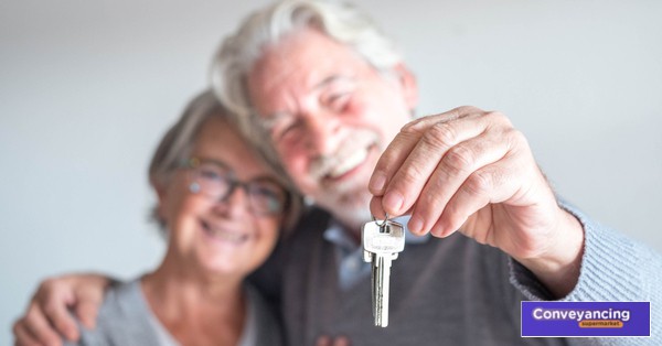 happy couple with house keys